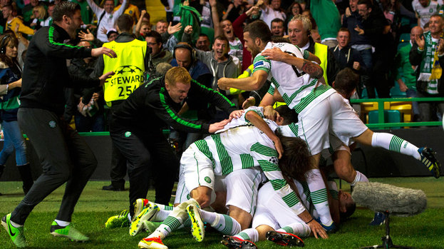 Lennon celebrating with players